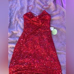 Red sequin knee length dress
